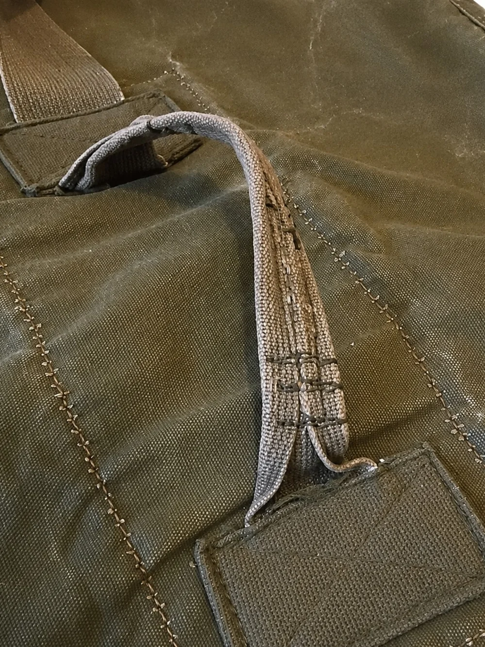 Vintage olive green canvas duffle bag